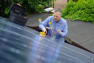 Solar panels installation on the house roof - photovoltaic business