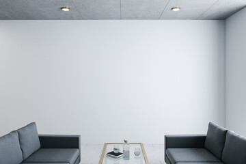 Modern waiting room in office with two black sofa