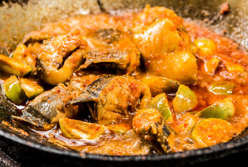 Frying cat fish with chili paste in pan, Thai famous food