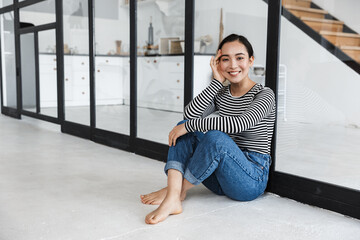 Smiling attractive young asian woman