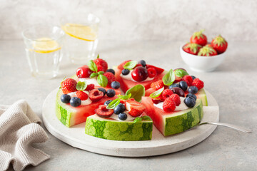 watermelon pizza slices with yogurt and berries, summer dessert