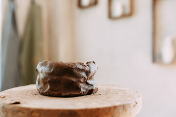 A product made of clay on a Potter's wheel. Pottery store with items. Preparation of clay.