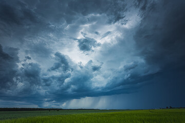 Fototapeta na wymiar Supercell storm clouds with intense tropic rain