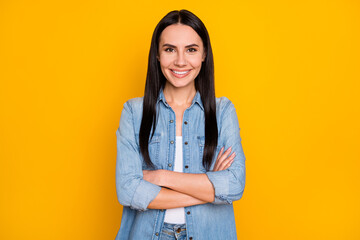 Close-up portrait of her she nice-looking attractive lovely lovable pretty cute content cheerful cheery straight-haired girl folded arms isolated on bright vivid shine vibrant yellow color background