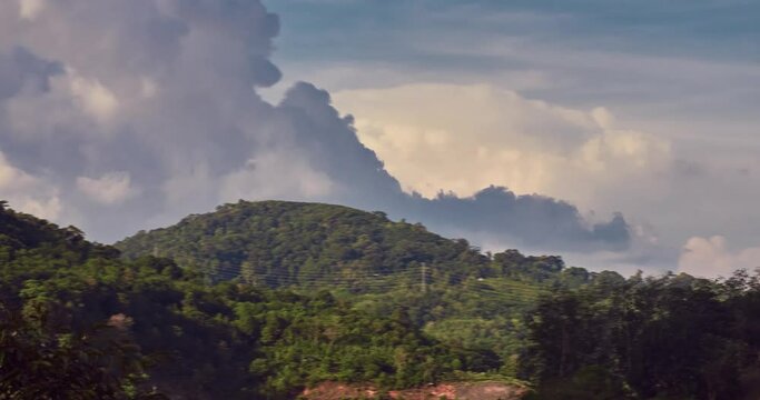 Hyperlaps cloudy sky near phuket hill. 4K DCI resolution 4096x2160 colored in Davinci Resolve 24 fps taken by GH5s