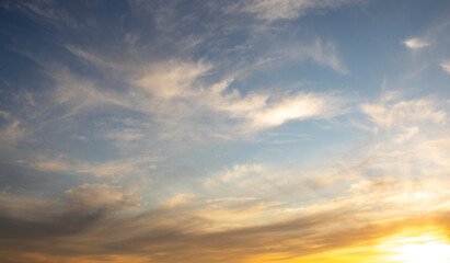Naklejka na ściany i meble Dramatic golden blue sunset over the ocean.