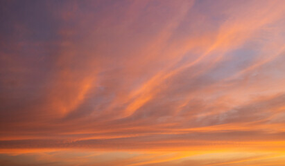 Dramatic golden pink sunset over the ocean
