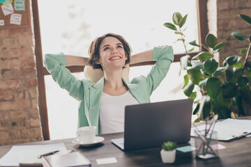 Photo of attractive business lady notebook table hands behind head good mood look up dreamer...
