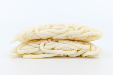 Udon noodles on white background