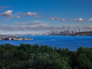 Fototapeta na wymiar Panoramic view of Sydney Harbour in NSW Australia on a cold winters day Partly cloudy skies 