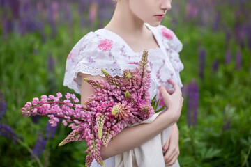 Fototapeta premium happy, smiling, little, relaxation, hat, hands, grass, outdoors, green, background, park, travel, tourist, village, color, style, boho, russian, season, russia, bloom, bohemian, fashion, wild, lilac, 