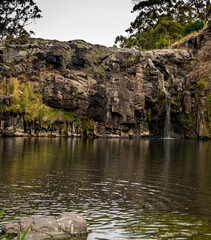 Fototapeta na wymiar Turpins falls is a picturesque waterhole near the small victorian country town of kneton macedon