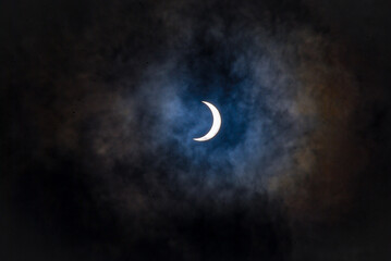 Obraz na płótnie Canvas Clouds eclipse a celestial show