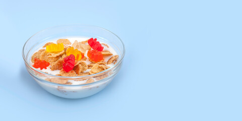 Fototapeta na wymiar Healthy eating breakfast bowl of low calories muesli with fruits and milk