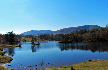 Fototapeta na wymiar Landscape view of Tarn Hows in The Lake District, Cumbria