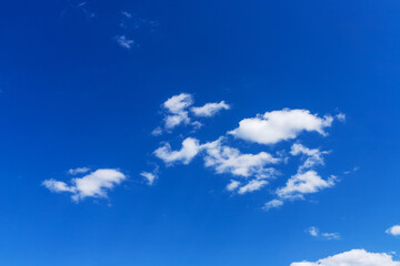 White clouds on a blue sky. Clear sky