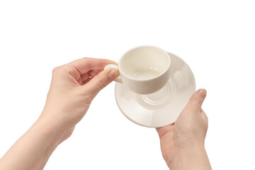 Empty coffee cup in woman hand isolated on white.