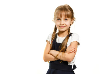 Little Funny girl in shirt. Isolated on white background. Baby girl in school. The child girl with textbooks. Girl studing.