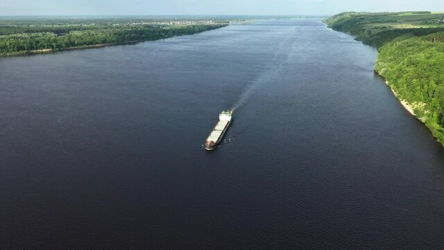 Ship goes along the Volga river, aerial view