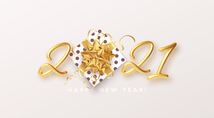 Gold realistic metallic text 2021 with gift box and golden bow. Vector illustration