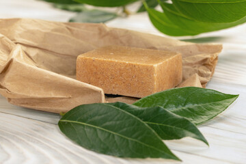 Homemade bay laurel natural soap with olive oil. Bar of Aleppo soaps, traditional Syrian product. Selective focus