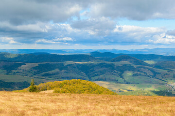 View of the highlands. Mountains with sky in the clouds.