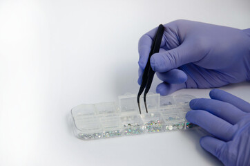 Work with tweezers close in sterile gloves
