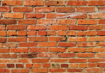 Weathered stained old brick wall. Texture for designer