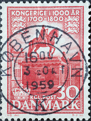 DENMARK - CIRCA 1955: A postage stamp from Denmark showing an equestrian statue of King Federik V....