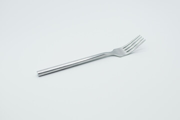 stainless fork in a white background