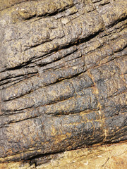 Background texture of some natural stone granite. multi-colored - red, gray.