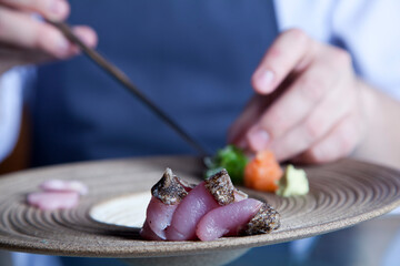 chef preparing japanese food