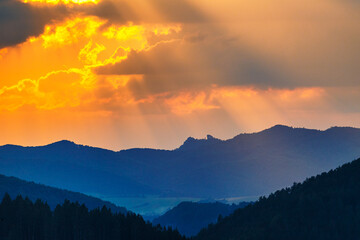 Colored view of horizons over the valleys near sunset, Carpathians mountains, Slovakia, Europe.