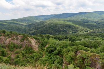 Fototapeta na wymiar The Eagle Battlefield (serbian: Orlovo bojiste) is a former quarry, where you’ll catch a breathtaking view of Fruska Gora. Panorama of Mount Fruska Gora