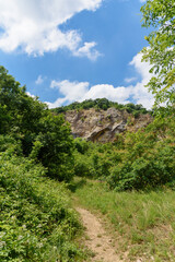 Fototapeta na wymiar The Eagle Battlefield (serbian: Orlovo bojiste) is a former quarry, where you’ll catch a breathtaking view of Fruska Gora. Panorama of Mount Fruska Gora
