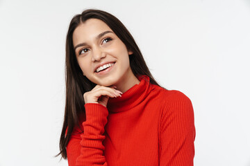Photo of joyful young woman posing and laughing at camera