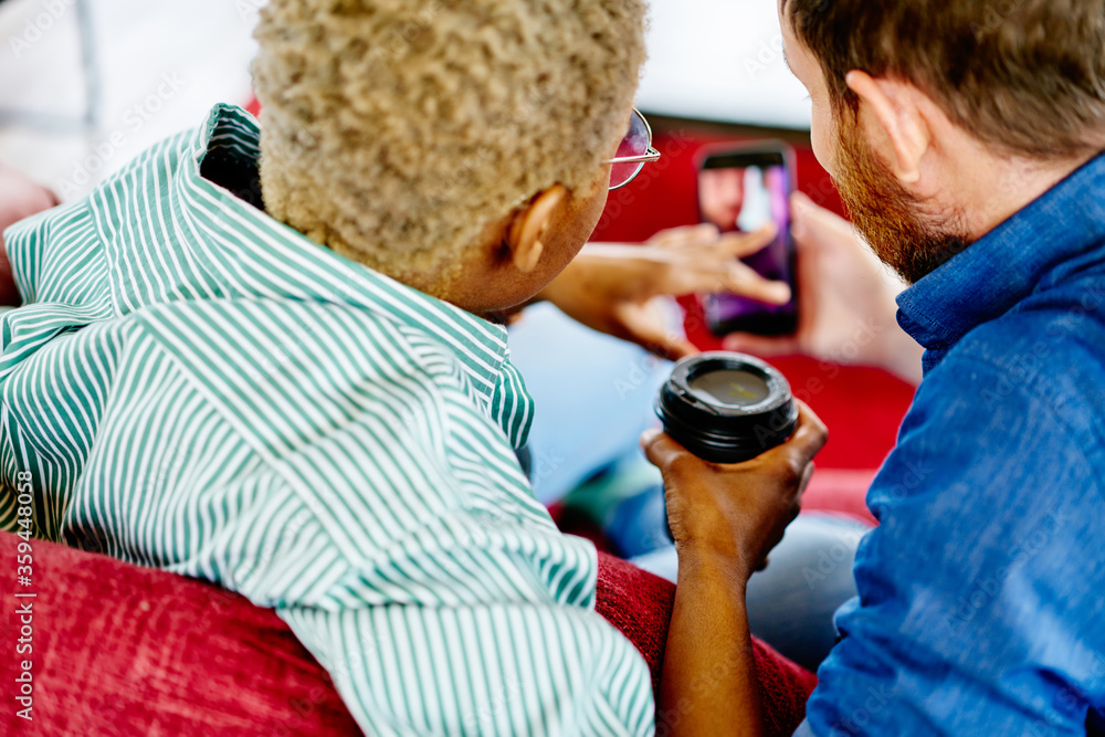 Poster cropped image of diverse young people choosing app on website to install on digital smartphone using