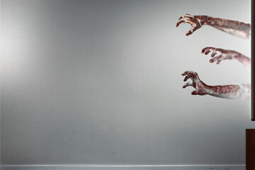 Zombie's hand coming out of the tv