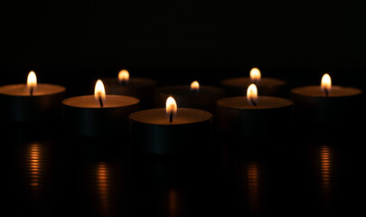 candles that are lit in the dark