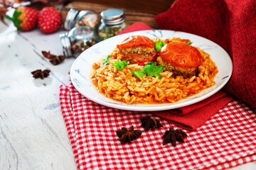 Stuffed tomatoes and rice with tomato