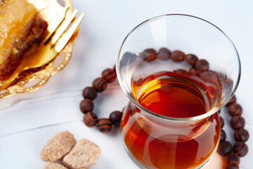 Turkish tea with oriental desserts on table