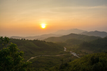 Landscape sunrise with mountain in the pilok , Kanchanaburi , Thailand