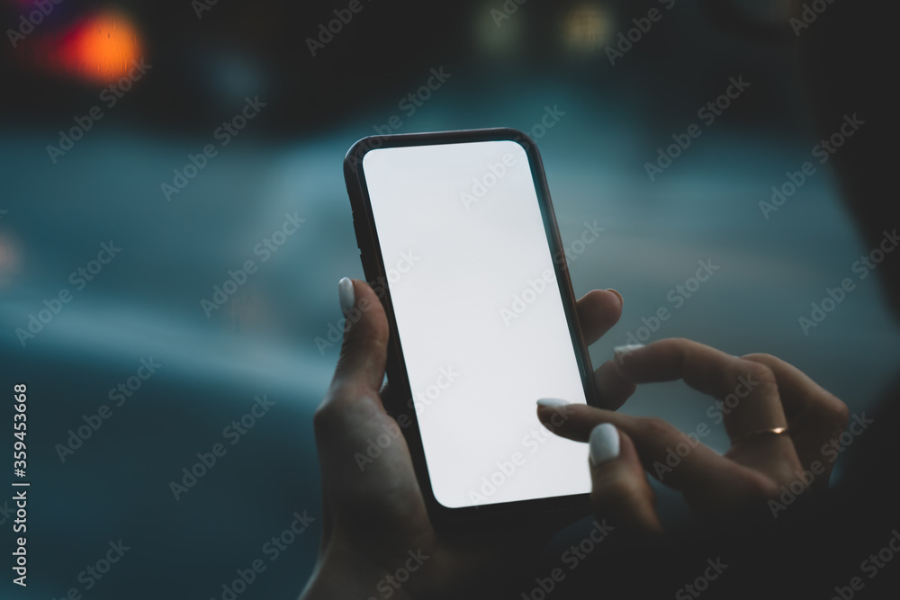 Poster cropped back view of modern smartphone with blank screen area for your internet content or website.f