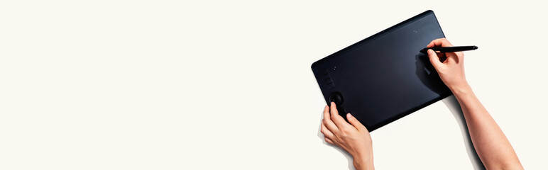 Fototapeta Person using a graphic pen tablet - flat lay obraz