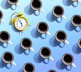 Seven AM alarm clock with coffee mags - flat lay