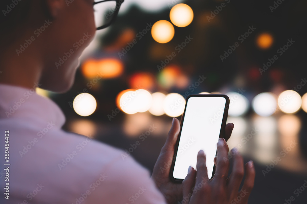 Aufkleber cropped view of young woman with finger typing text message on blank screen of modern smartphone and