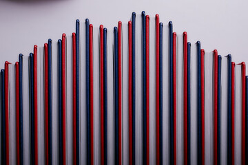 concept of red and blue books arranged in the form of degrees