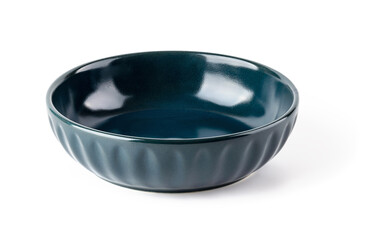Empty dark blue ceramic bowl isolated on a white background. Clay, ceramics or porcelain crockery and tableware.