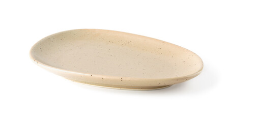 Empty oval beige ceramic plate isolated on a white background. Clay, ceramics or porcelain crockery and tableware.