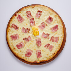 Pizza with bacon on a white background. Top view.